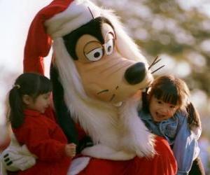 Puzzle de Goofy vestido de Papá Noel abrazando a dos niñas