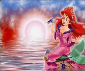 Puzzle de La sirenita Ariel con un vestido muy elegante junto a sus amigas las tortugas