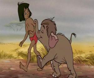 Puzzle de Mowgli acompañado de un pequeño elefante