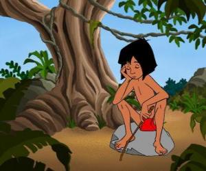 Puzzle de Mowgli sentado en una roca pensando