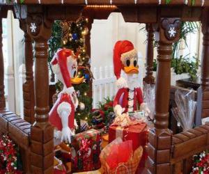 Puzzle de Pato Donald y Daisy con sus vestidos de Papá Noel