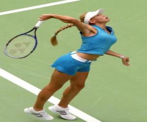Puzzle de Anna Kournikova preparandose para golpear un saque