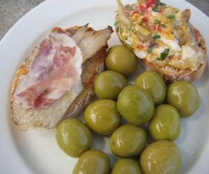 Puzzle de Aperitivo con dos montaditos y unas aceitunas