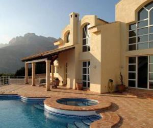 Puzzle de Casa con piscina