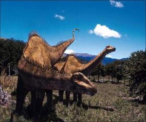Puzzle de Dos dinosaurios en el paisaje