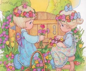 Puzzle de Dos niñas recogen flores. Precious Moments