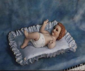 Puzzle de El Niño Jesús en el pesebre
