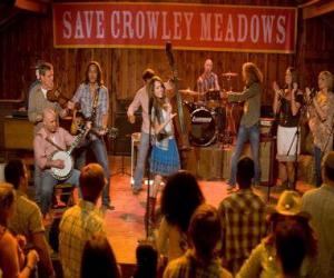 Puzzle de Hannah Montana (Miley Cyrus) interpretando una de sus canciones en Crowley Corners, el pueblo que vio crecer a Miley.