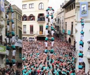 Puzzle de Histórico castillo humano, 'castell', torre dos personas por ocho pisos, levantado y descargado por los Castellers de Vilafranca el 1 de noviembre de 2010