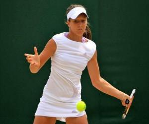 Puzzle de Jugadora de tenis preparada para un golpe