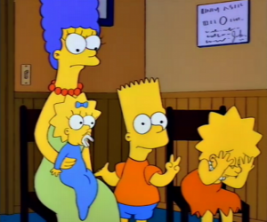 Puzzle de Marge con sus hijos Bart, Lisa y Maggie en la consulta del médico