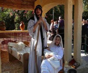 Puzzle de Maria, San José y el Niño Jesús en el pesebre viviente