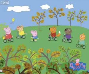 Puzzle de Peppa Pig y sus amigos montando en bicicleta