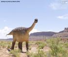 Dinosaurio en un paisaje desértico