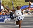Atleta vencedor en la linea de llegada