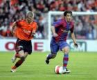 Jugador de futbol (Bojan Krkic F.C.B) conduciendo el balón