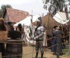 Guerrero protegido con armadura y casco y armado