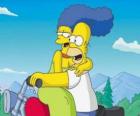 Homer y Marge Simpson en moto