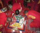 Monjes haciendo un mandala