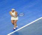 Maria Sharapova preparandose para golpear un saque