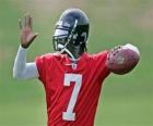 Michael Vick en acción, preparado para intentar un pase
