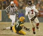 Michael Vick corriendo con el balón en la mano