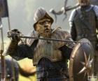 Miraz, el falso rey de Narnia y tío de Caspian, en un combate con la espada y el escudo