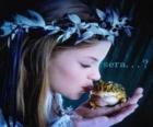 Princesa con una rana en la mano