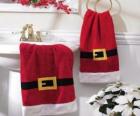 Baño decorado con toallas Papá Noel