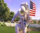 El capitán Charles Chuck Baker, clavando la bandera americana al aterrizar en Planet 51