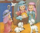 Jesús en el pesebre junto con José, Maria y un pastor con sus ovejas