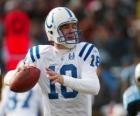 El quarterback en acción, preparado para intentar un pase