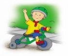 Caillou, montado en bicicleta