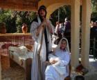 Maria, San José y el Niño Jesús en el pesebre viviente