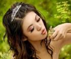 Princesa dando un beso a una rana