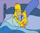 Homer y Marge dandose un beso de buenas noches