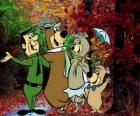 Los protagonistas de las aventuras: el Oso Yogui, Bubú, la osa Cindy y el guardia del parque Smith