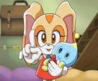La conejita Cream the Rabbit con su Chao, Cheese