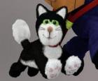 El gato Jess es un gato blanco y negro que siempre acompaña a Pat el cartero