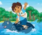 Diego en el mar sobre el caparazón de una gran tortuga marina