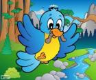 Pájaro con un gusano