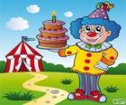 Payaso con un pastel de aniversario