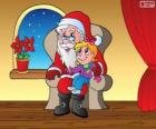Niña pequeña con Papá Noel