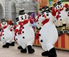 Muñecos de nieve bailando