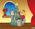 Niños decorando el árbol de Navidad