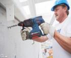 Manitas preparado para trabajar con el taladro