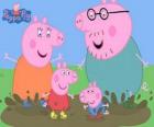 La familia Cerdo jugando con los charcos