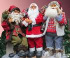 Tres muñecos de Papá Noel