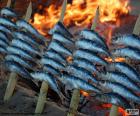 Sardinas cocinadas con leña