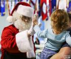 Niña y Santa Claus